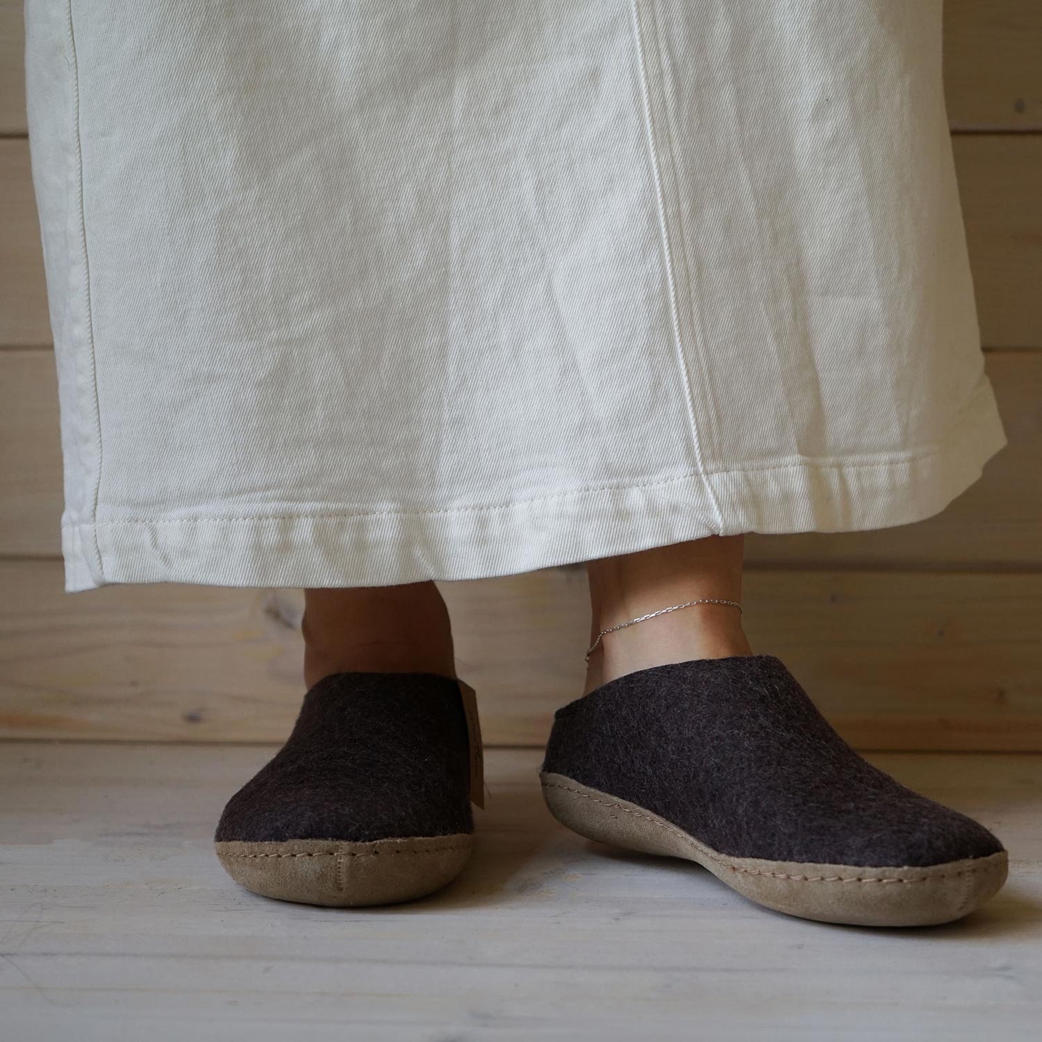 Woman Wears Leather Soled Glerups Mules in Charcoal