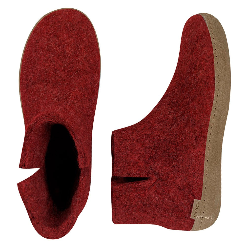 Arial and side view of Red Glerups boots with leather sole