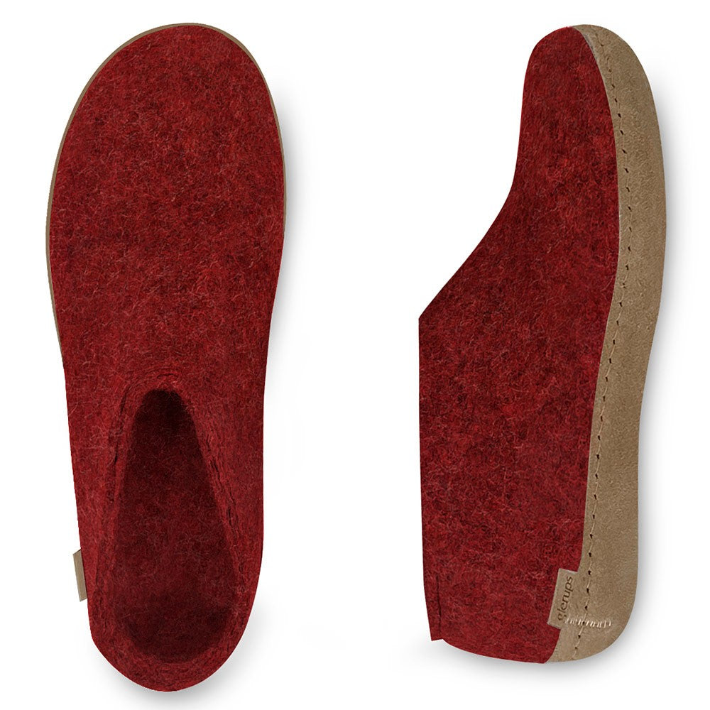 An arial and side view of a pair of Red leather soled Glerups in the shoe style.