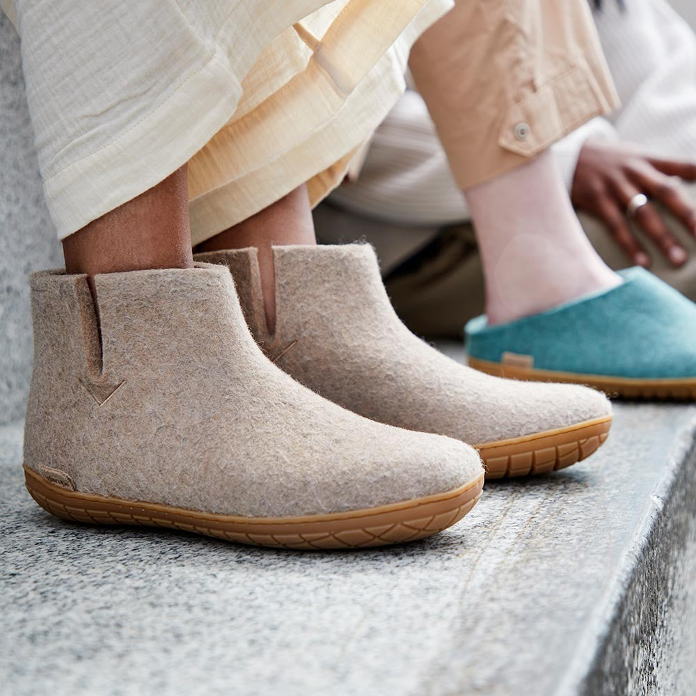 A man wears Glerups Felted Wool Rubber Sole Boot - Sand