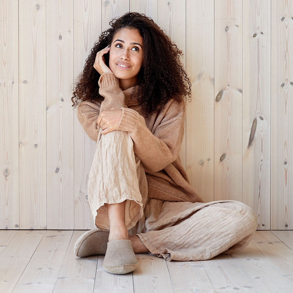 Woman wearing Glerups leather soled mule in Sand
