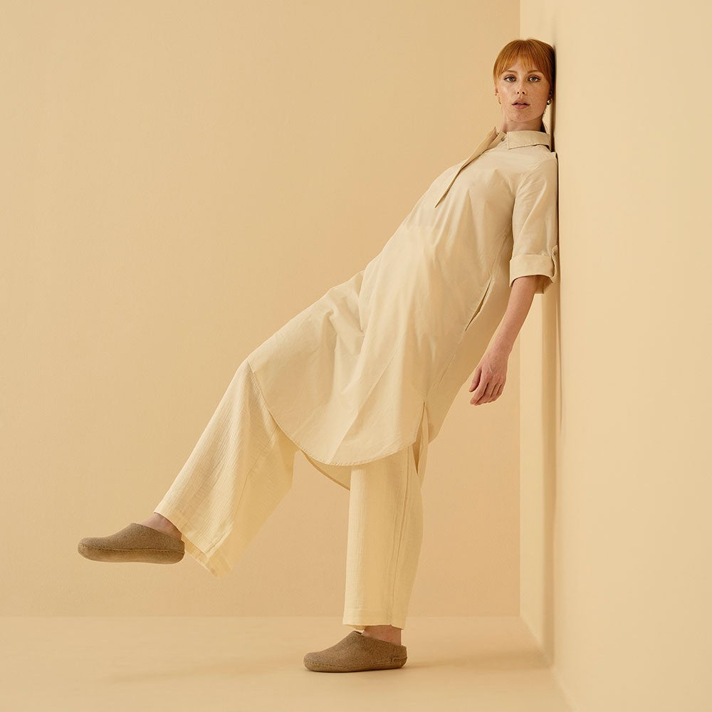 Woman wears Leather Soled Sand Glerups in Mule Style