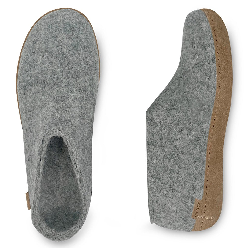 An arial and side view of a pair of Glerups leather soled shoes in grey