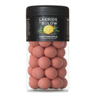 Jar of Lakrids by Bulow Pink Pineapple chocolate coated liquorice on a white background