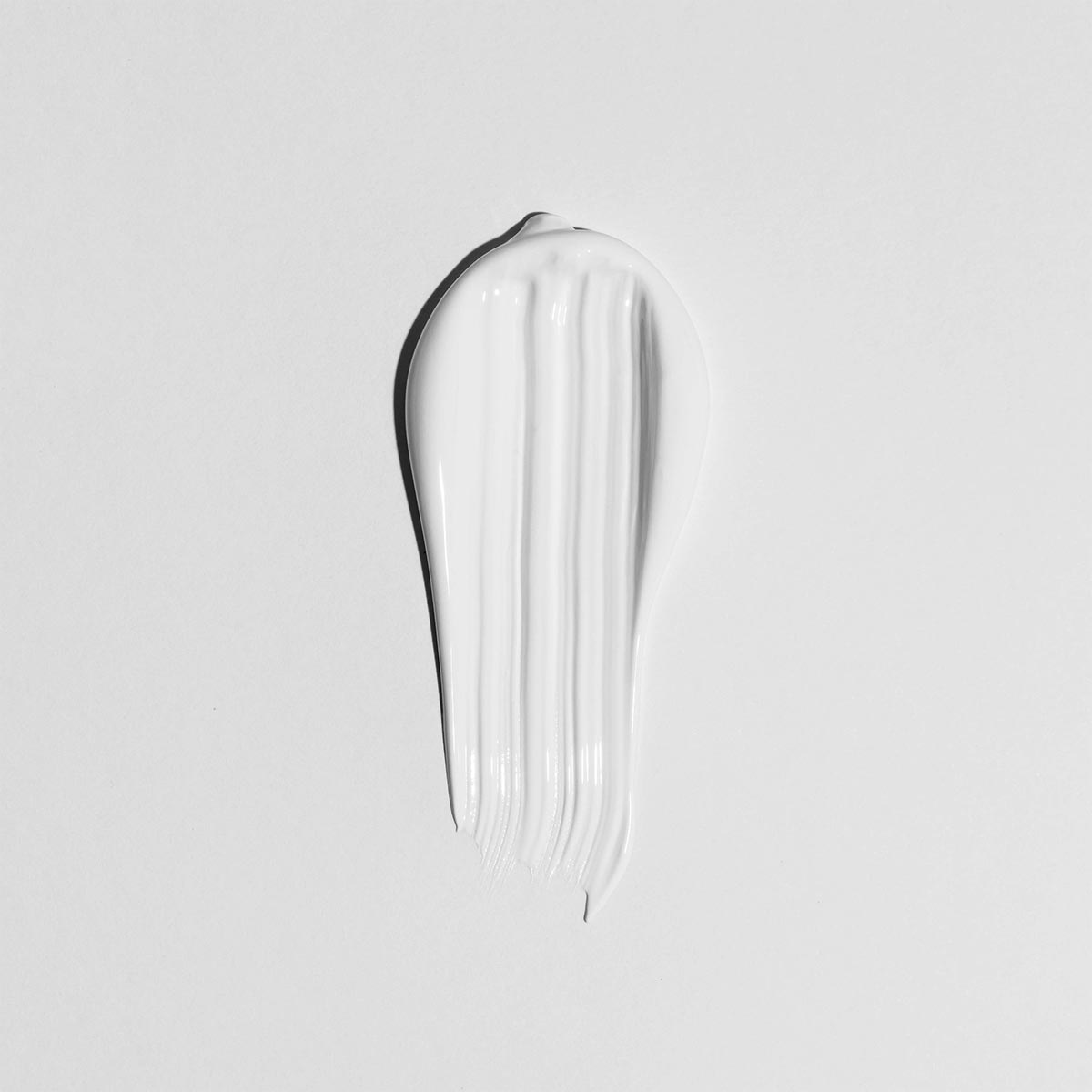 Aolis hand cream smear on a white background