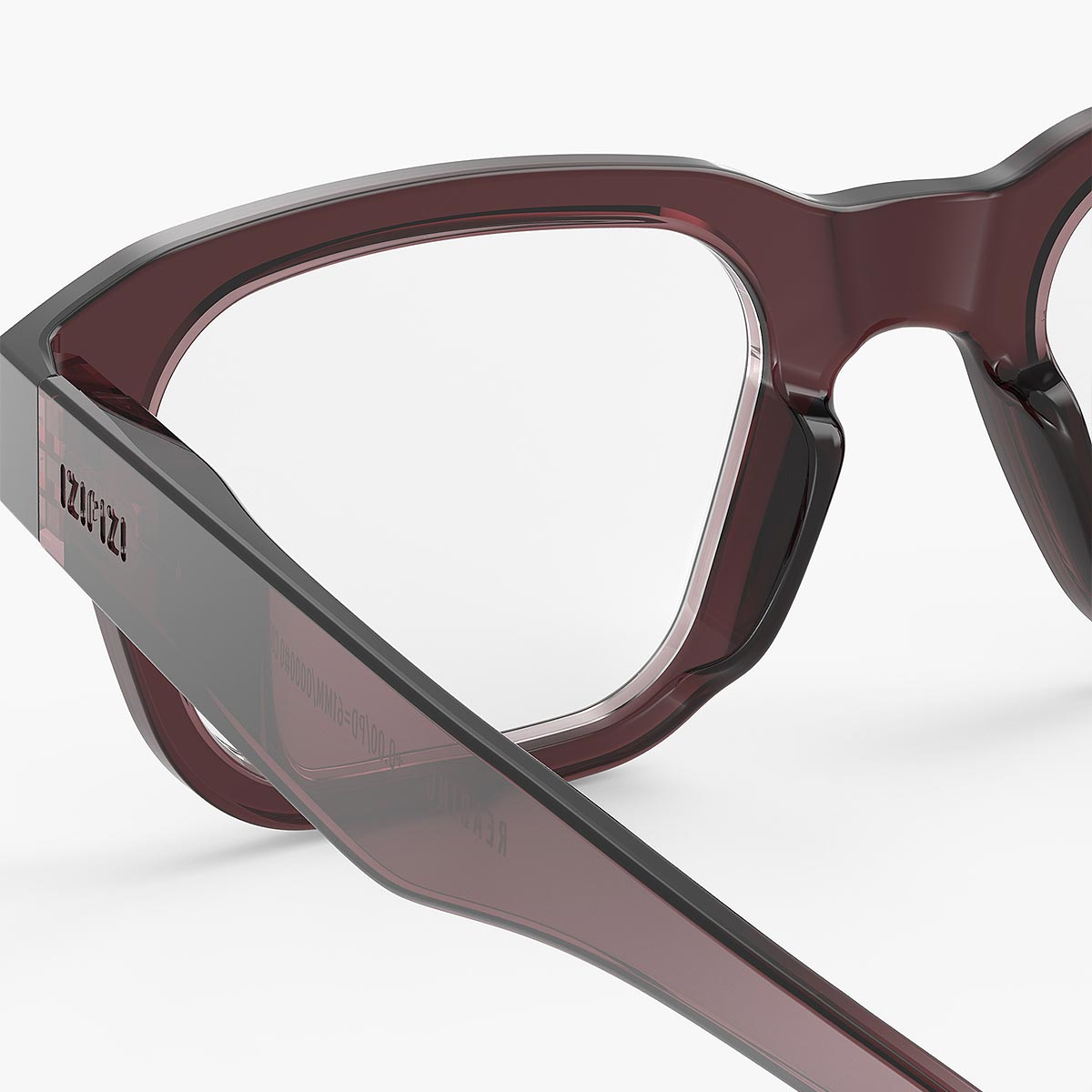 Close-up of a pair of IZIPIZI glasses with a clear lens on a white background