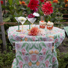 Ekelund 'Sonja' hand towels arranged outside on a table with strawberry desserts and red and orange flowers