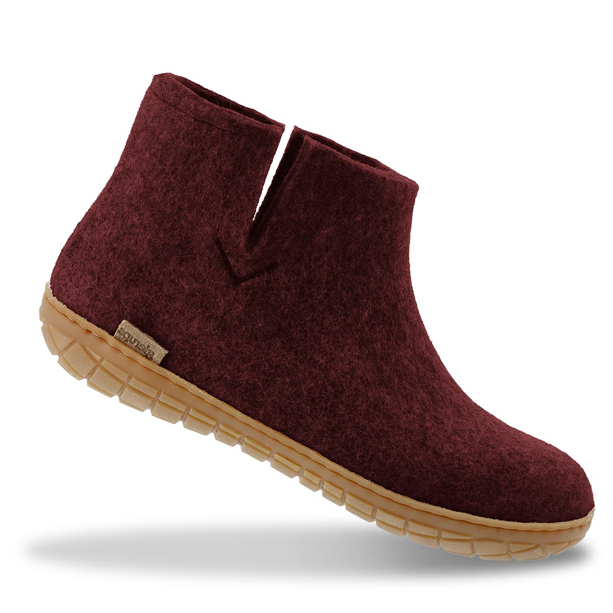 A single Glerups beet rubber soled boot