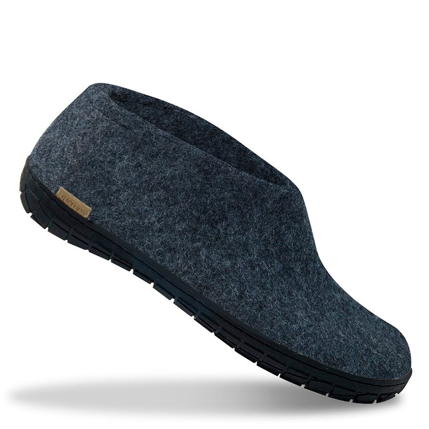 A single black rubber soled denim Glerups shoe