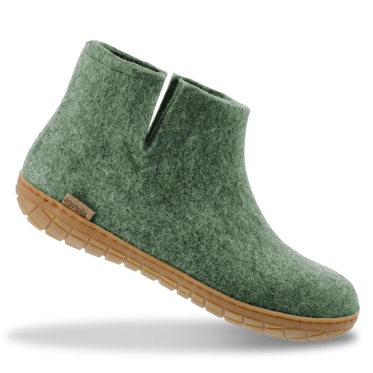 A single rubber soled boot in moss