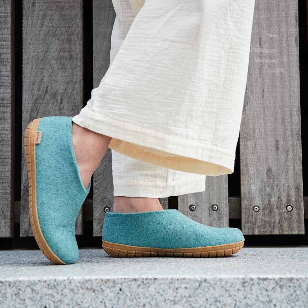 A woman wears Glerups Felted Wool Rubber Sole Shoe - North Sea