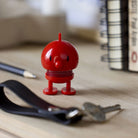 Hoptimist Mini Red Bumble on a desk with books and ring of keys 