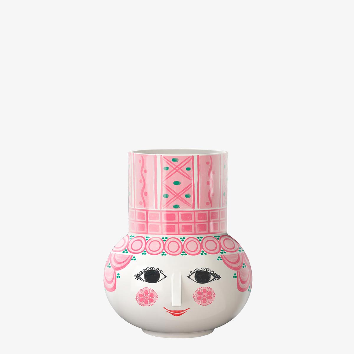Decorative Bjørn Wiinblad Olga pink ceramic vase with face design on a white background