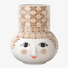 Decorative Bjørn Wiinblad large Olga ceramic vase with a face design on a white background
