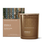 Skandinavisk Stuga scented candle and packaging with forest design.