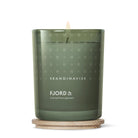 Fjord Green candle with 'Skandinavisk' branding on a white background