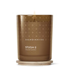 Skandinavisk Stuga candle on a white background