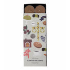 Pluto Pack of scented tea lights with colourful illustrations on the packaging