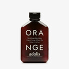 Bottle of Orange aeolis body lotion on a white background