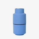 Blue crushgrind grinder on a white background