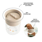Annotated diagram of the features of the Done by Deer 360 learning cup on a white background.