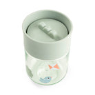 Image taken from above of the Done by Deer 360 drinking cup in mint green against a white background.