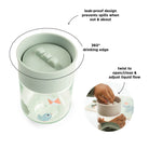 Annotated diagram of the features of the Done by Deer 360 learning cup on a white background.