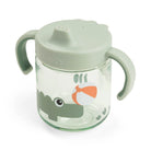 Done by Deer pastel green grippy spout cup on white background.