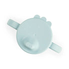 Image taken from above of Done by Deer light blue grippy spout cup.