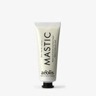 Hand cream tube labeled 'Mastic' by 'aeolis' on a white background