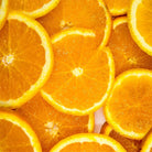 Close-up of sliced oranges used in aeolis citrus hand cream