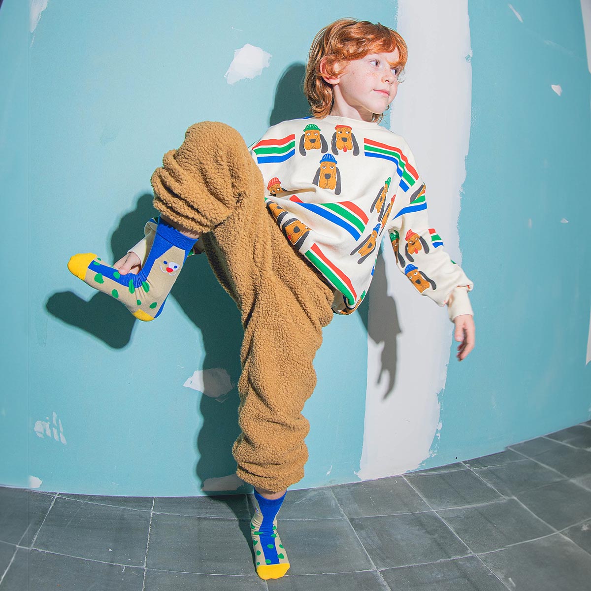 child wearing Eat My Socks happy Dog Socks