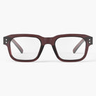 Maroon eyeglasses on a white background
