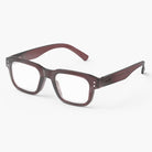 Pair of eyeglasses with a maroon frame on a white background