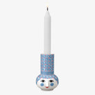 Bjorn Wiinblad Blue Candle holder with decorative face design on a white background