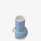Decorative Bjorn Wiinbla ceramic candle holder with blue and red pattern on a white background
