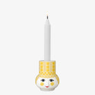Bjorn Wiinblad Olga Candle Holder yellow on a white background