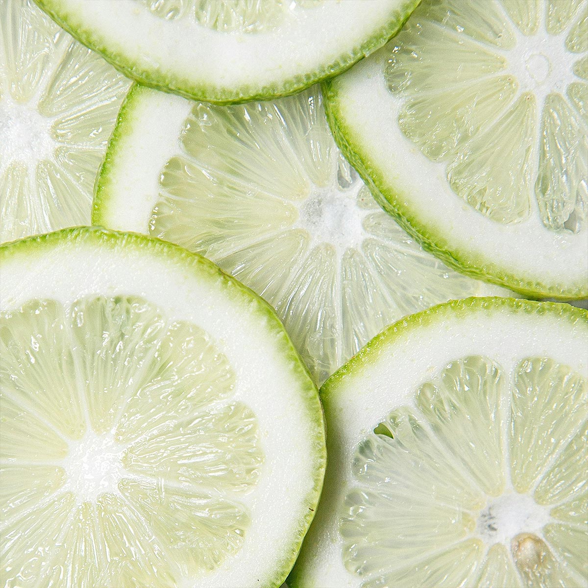 Close-up of sliced limes used in aeolis shower gel