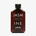 Brown bottle of Jasmine aeolis shower gel with black cap on a white background