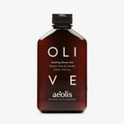 Brown bottle of aeolis soothing olive shower gel on a white background