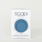 A white rectangular box labeled 'soapi Starter Kit' with a circular cutout showing a petrol blue magnetic soap holder, photographed against a plain light background.